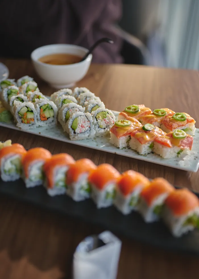 salmon rolls, slate, tea